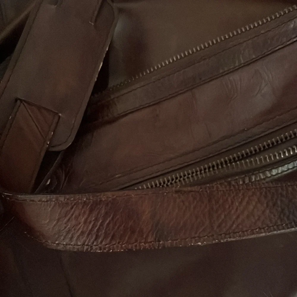 Pottery Barn Grant Dark Brown Leather Duffel Bag with Top Handles.